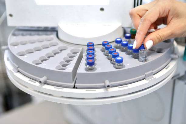 istock Quality Control Laboratory medicine. Chromatograph operation. A woman makes an analysis on a gas chromatograph. Development of a new vaccine against the covid-19 virus 1217424368