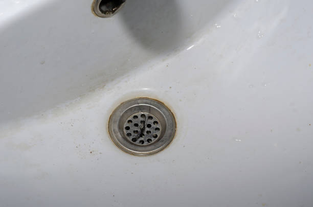 istock Dirty ceramic sink in a motel. 1217425751