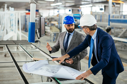 Job Machine Ceo Engineer Explaining Machine Functioning To Company Ceo Stock Photo ...