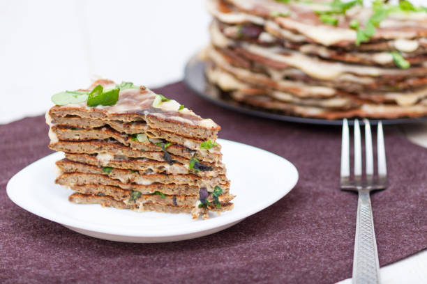 istock Liver cake closeup with mayonnaise on white background. 1217429254