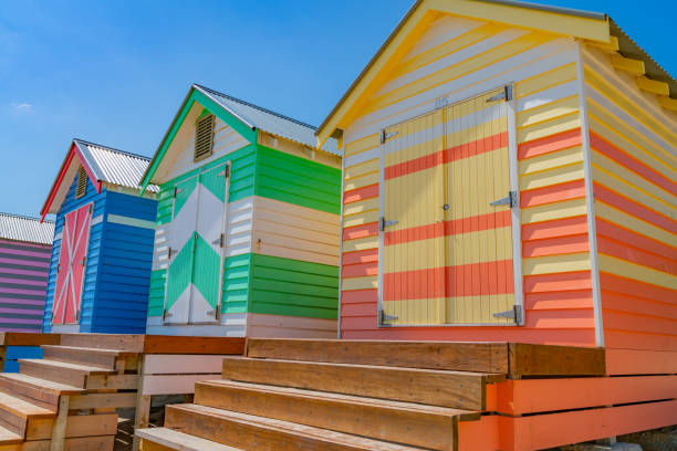 istock Steps leading to doors of colourful Brighton Beach Boxes on beach at Melbourne. 1217429660