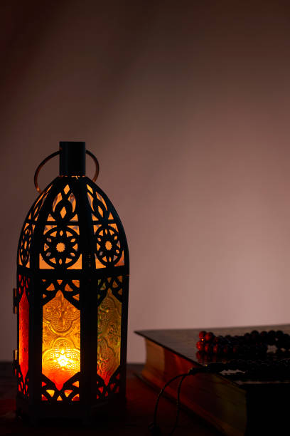 istock Arabic lantern and Holy Quran, Ramadan kareem background 1217433212