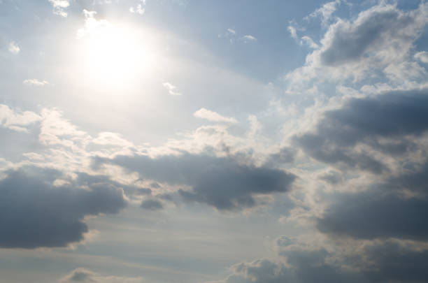 istock The sun with clouds. Nice view of the bright sun. Clouds lit by the sun. 1217436607