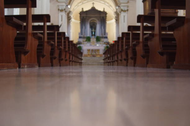 istock Interior view of a modern church with empty pews 1217438514