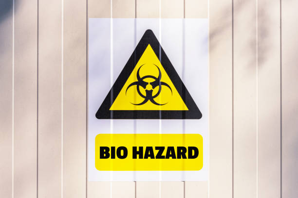 istock Yellow biological hazard warning sign on the wall 1217444431