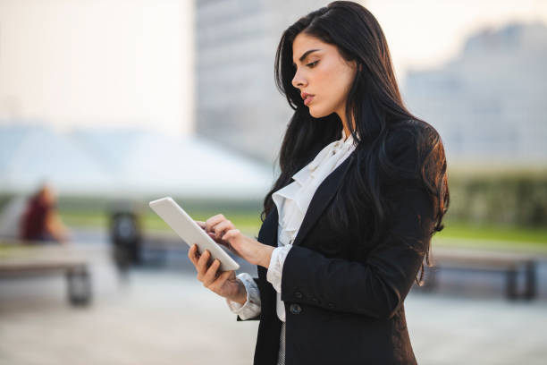 istock Businesswoman using digital tablet and working 1217444588