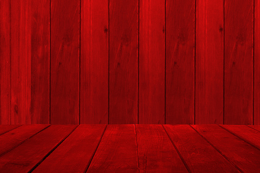 Empty display. Background and table of red wooden planks. Copy space for your text.