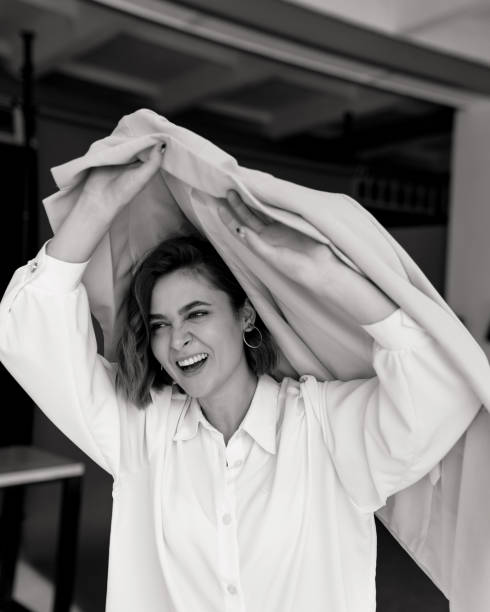 istock Happy beautiful woman smiling at camera 1217445910