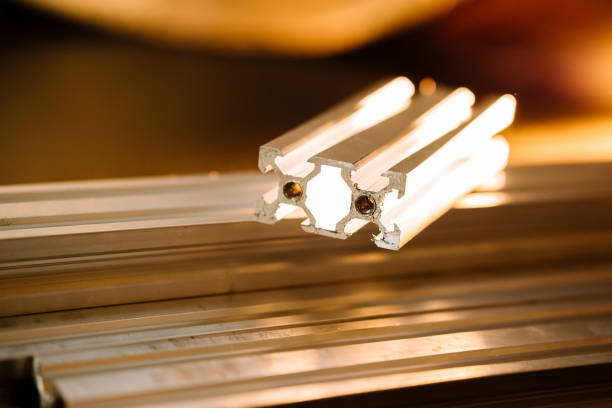 istock v slot aluminum profile lies on a black table, work surface with a bright lantern. how to assemble a cnc machine do it yourself 1217447916