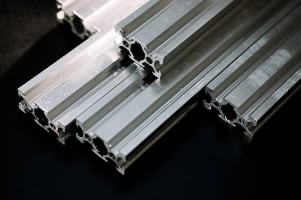 istock v slot aluminum profile lies on a black table, work surface with a bright lantern. how to assemble a cnc machine do it yourself 1217447935