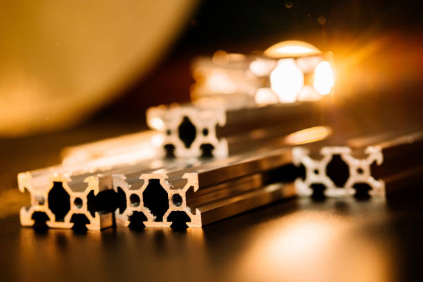 istock v slot aluminum profile lies on a black table, work surface with a bright lantern. how to assemble a cnc machine do it yourself 1217447942