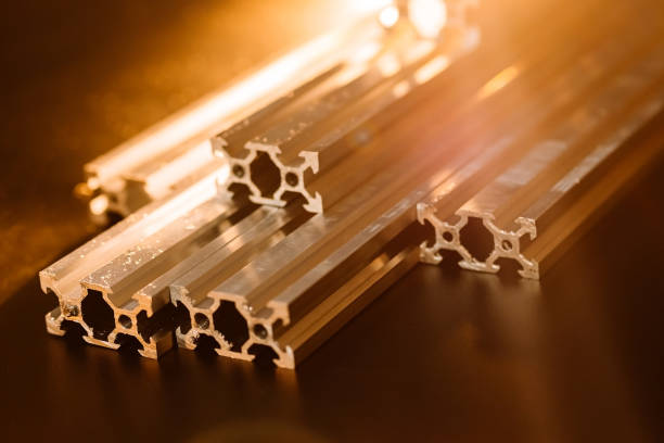 istock v slot aluminum profile lies on a black table, work surface with a bright lantern. how to assemble a cnc machine do it yourself 1217447953