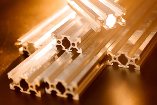istock v slot aluminum profile lies on a black table, work surface with a bright lantern. how to assemble a cnc machine do it yourself 1217447960