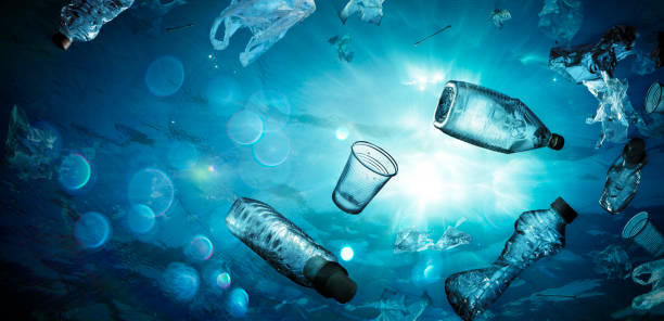 istock Plastic Pollution In Ocean - Underwater Shine With garbage Floating On Sea - Environmental Problem 1217447971