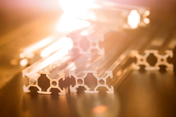 istock v slot aluminum profile lies on a black table, work surface with a bright lantern. how to assemble a cnc machine do it yourself 1217448013