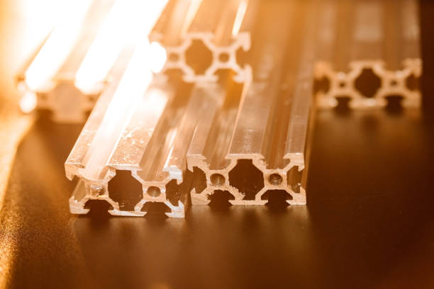 istock v slot aluminum profile lies on a black table, work surface with a bright lantern. how to assemble a cnc machine do it yourself 1217448137