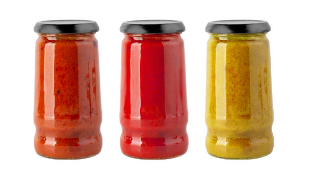 istock Tomato sauce jar on white background 1217449420