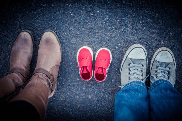 a mother and father waiting - pair couple mid adult happiness imagens e fotografias de stock