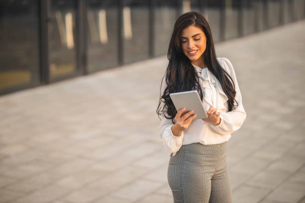 istock Businesswoman using digital tablet and working 1217450603