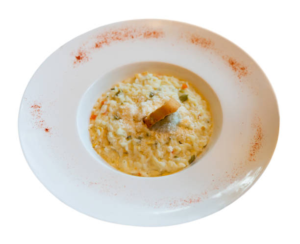 istock Risotto with chicken, vegetables and parmesan 1217451892