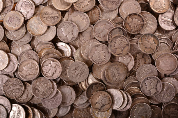 istock Background of old Silver USA Coins 1217452575