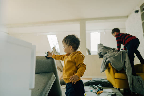 istock Little boys having fun at home 1217453735