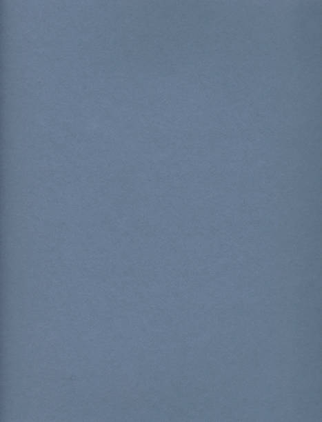 istock Craft paper texture. Colored paper closeup. Old paper background for design. 1217454598