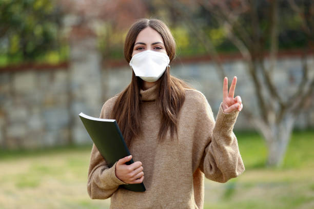 istock Girl in respiratory mask 1217454952