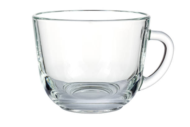 istock Empty transparent glass cup with round handle isolated on white background 1217454984