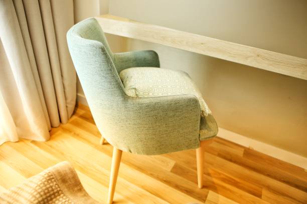 istock Minimalistic chair in apartment. 1217457846