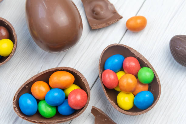 istock Chocolate Easter eggs and chocolate eggs filled with sweet and colorful candies 1217461745
