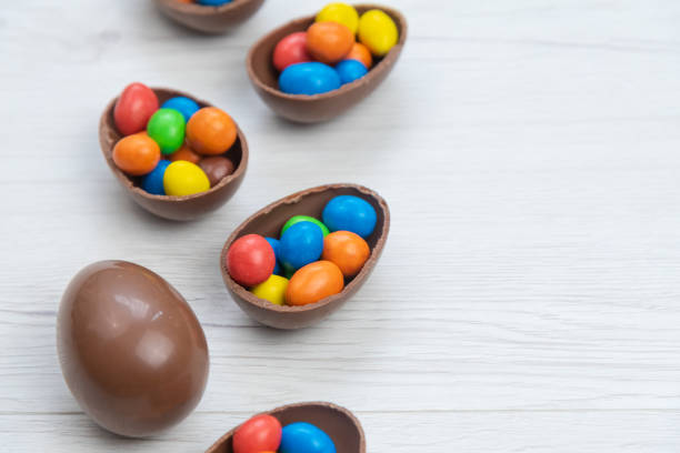 istock Chocolate Easter eggs and chocolate eggs filled with sweet and colorful candies 1217461755