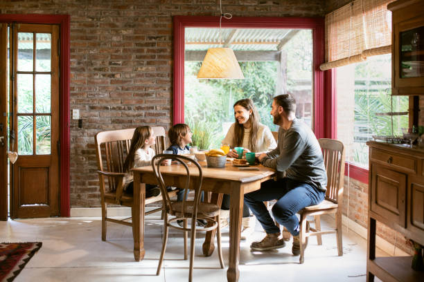 istock Family with two kids eating breakfast together 1217462539
