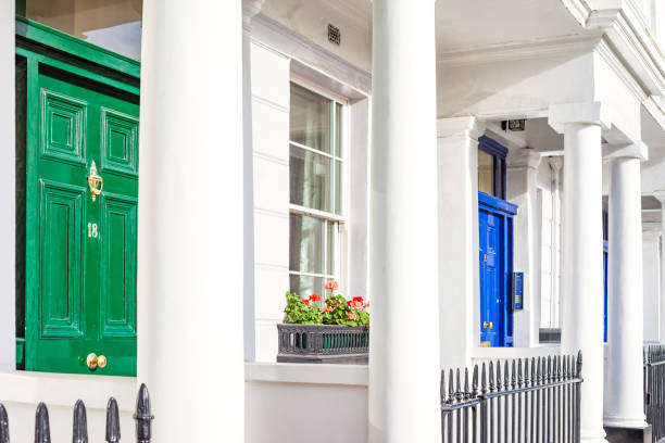 Georgian style townhouses in Pimlico London England UK Traditional white stucco Georgian style townhouses in the Pimlico district of London England UK blue front door stock pictures, royalty-free photos & images