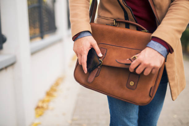 istock Close up of a man holding a briefcase. 1217463902