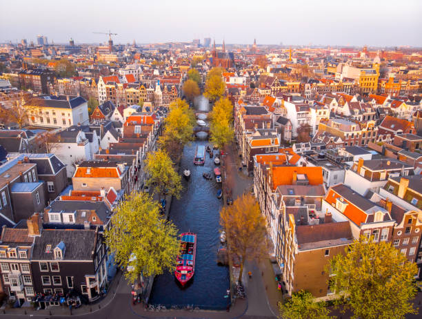 istock Aerial view of Amsterdam after sunset, Netherlands 1217473341