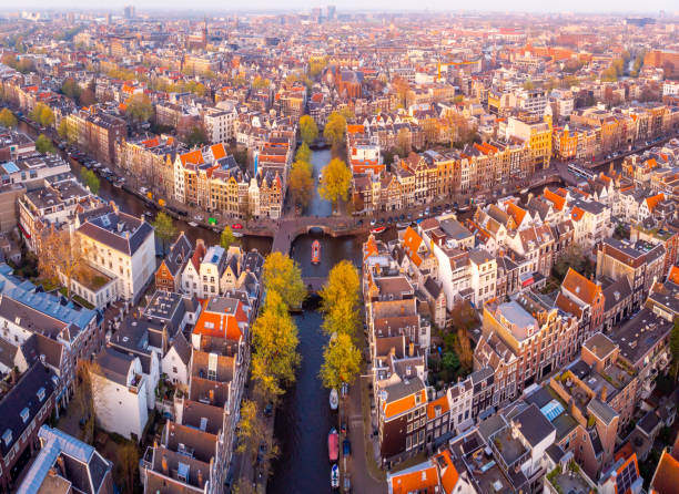 istock Aerial view of Amsterdam after sunset, Netherlands 1217473785