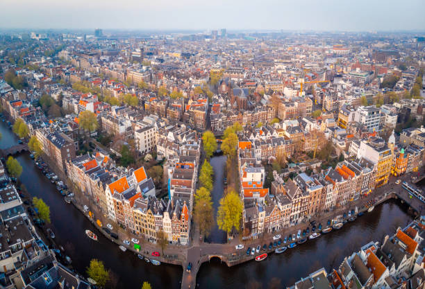 istock Aerial view of Amsterdam after sunset, Netherlands 1217475189