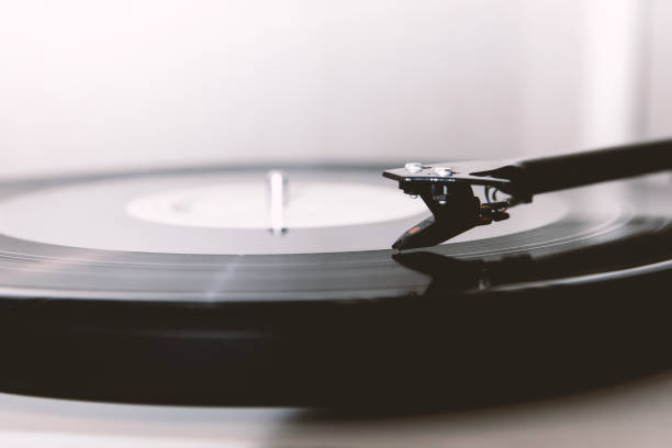 istock A needle playing an old vinyl. Close-up view. 1217478430