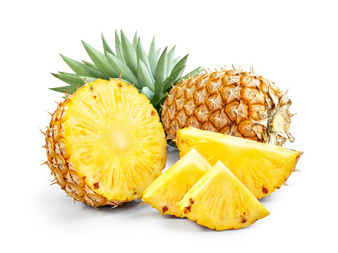 Top view of various multicolored fruits and vegetables disposed side by side at the center of the image on a stripe shape leaving a useful copy space at the top and at the bottom on white background