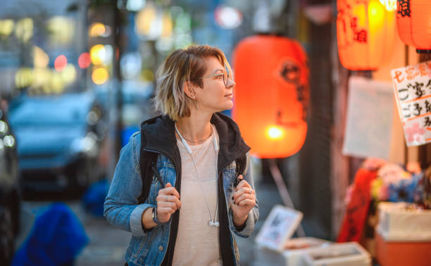 istock Relaxed Caucasian Vacationer Exploring Stores in Shinjuku 1217480569