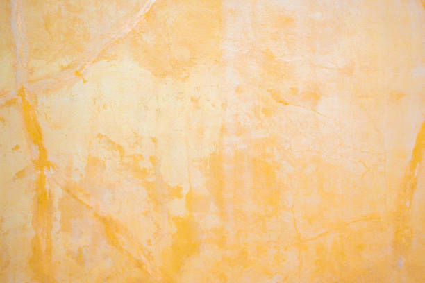 istock Orange color concrete wall texture background 1217480668