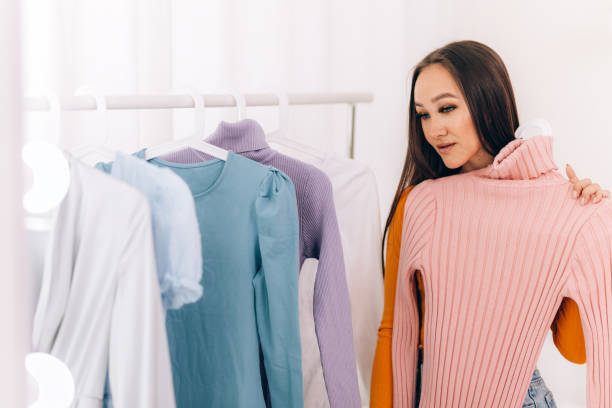 istock Girl chooses clothes 1217480763