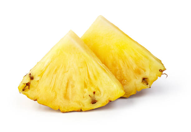istock Pineapple with slices isolated on white background 1217481596