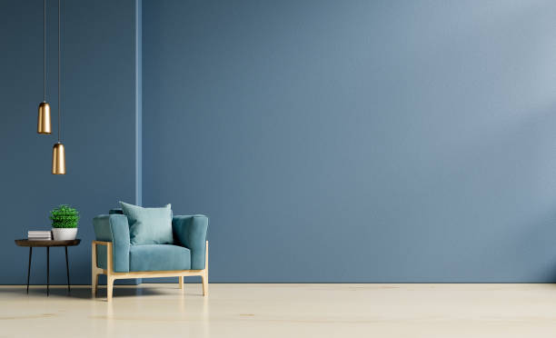istock The interior has a armchair on empty dark blue wall background. 1217483943