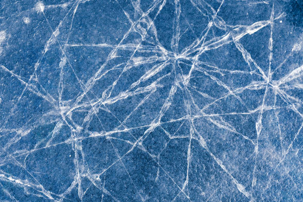 istock ice. texture of frozen water 1217486249