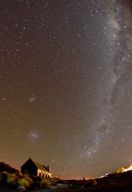 istock meadow church and milky way galaxy 1217501837