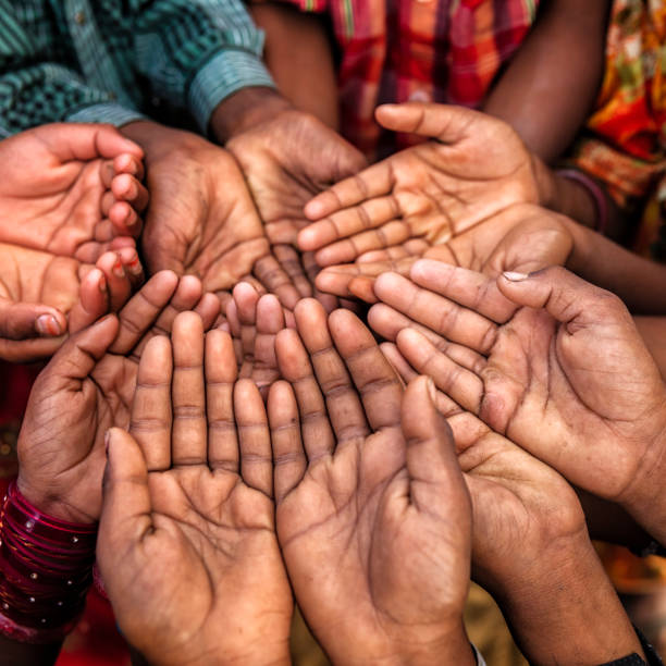 istock Poor Indian children asking for food, India 1217510984
