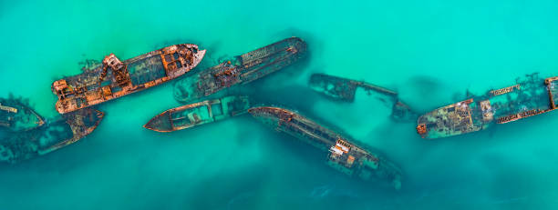 Tangalooma Shipwrecks off Moreton island, Queensland Australia Tangalooma Shipwrecks off Moreton island, Queensland Australia scuttle stock pictures, royalty-free photos & images