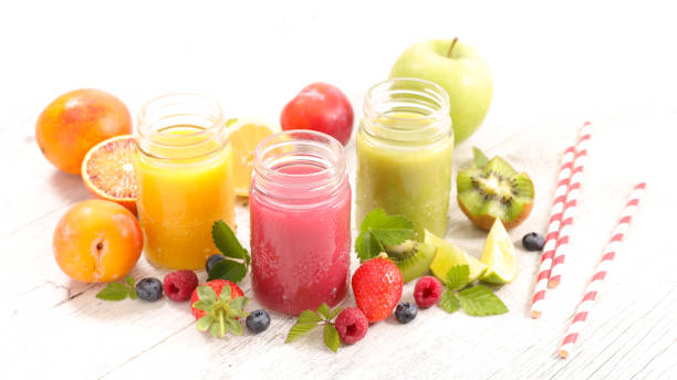 istock fruit juice- berry fruit, orange, kiwi, smoothie and straw 1217518718
